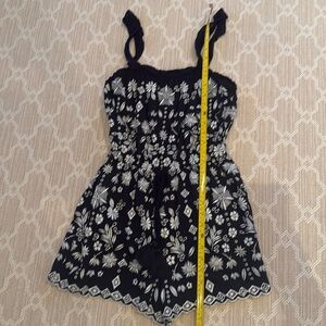 Intermix size P (small) black with white ebroidery  shorts romper. Excellent